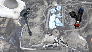 Replacing Spark Plugs Ignition Coils and Fuel Injectors  2014 Chrysler 300S [upl. by Mastat]