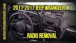 20112017 Jeep Wrangler JK radio removal [upl. by Mulford]